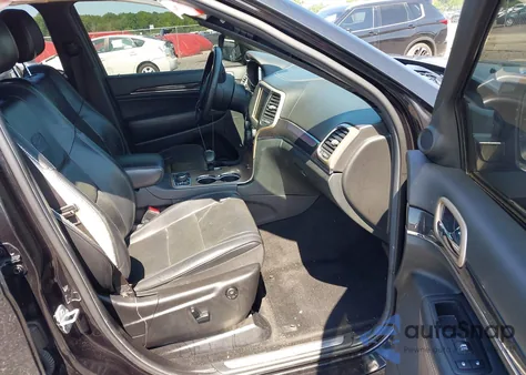 2014 Jeep Grand Cherokee Overland z USA, uszkodzony, nr VIN 1C4RJFCT5EC302709